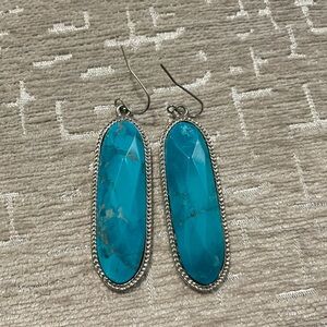 Vibrant Blue Oval Earrings with Silver Accents